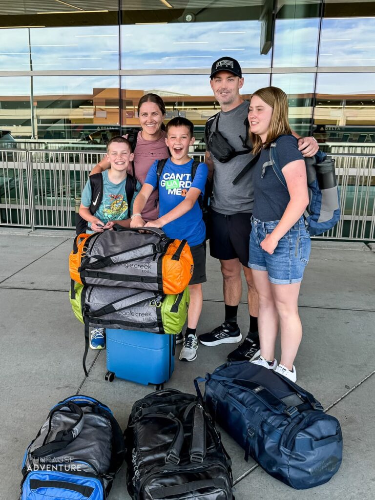 Family with all their bags for a year long trip